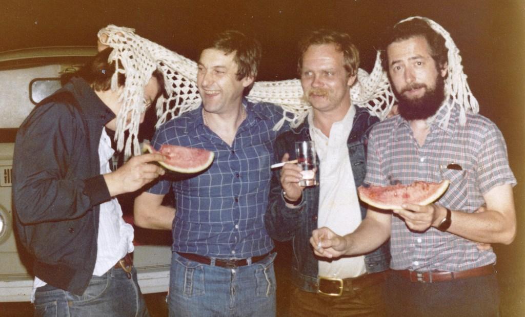 Me (obscured by Sue's shawl), Neveo, Don and Gowan at the watermelon stall in Piazzale Cella